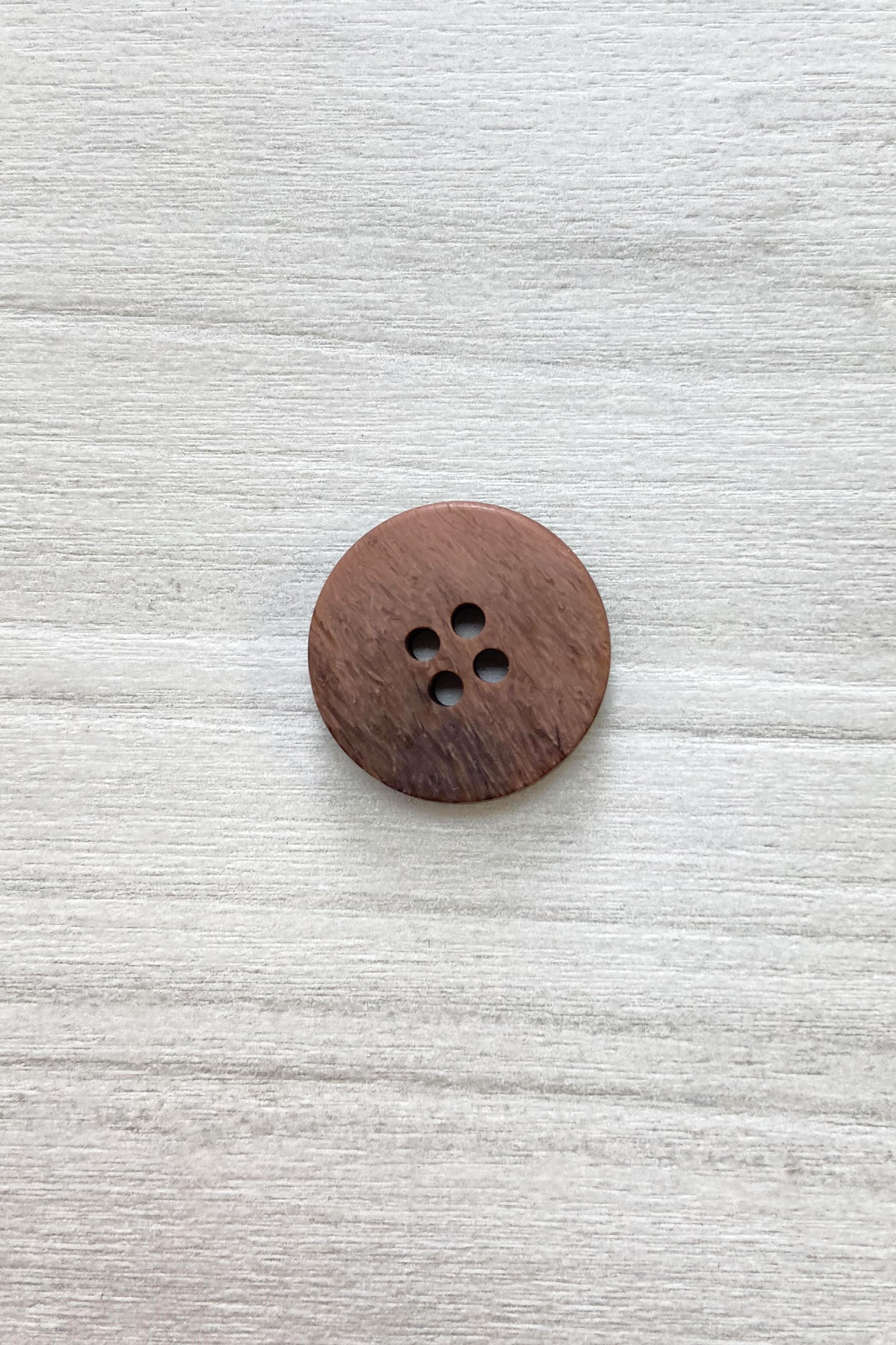 Caramel / chocolate button